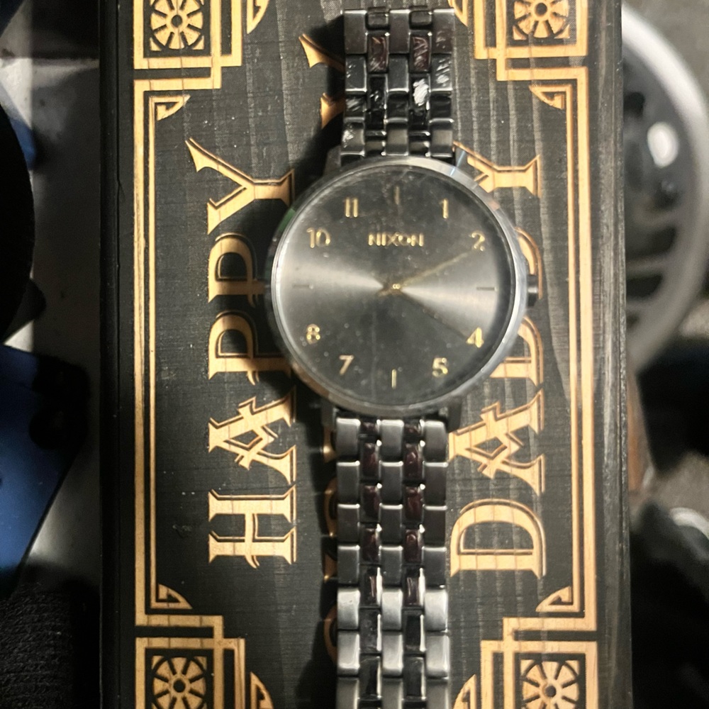 Nixon watch in good condition just needs battery.